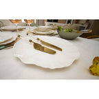 Gouden taart en messchop met transparant handvat