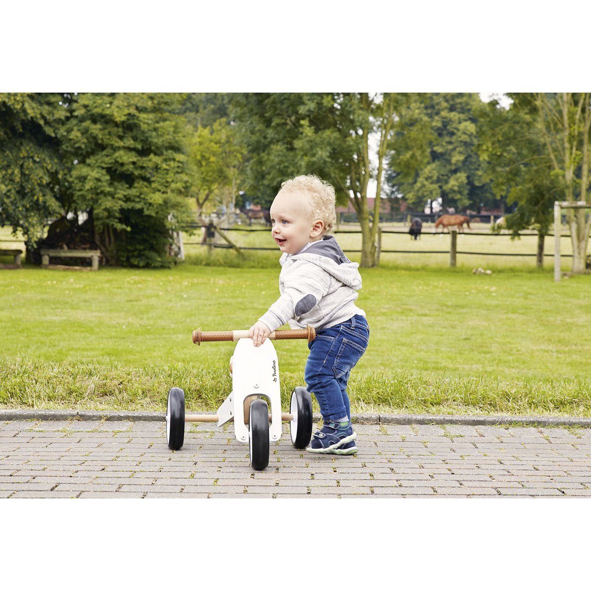 4-in-1 Wooden Ride-On Toy